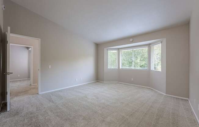A large empty room with a door and a window. at Harbor Pointe, Dana Point, CA, 92629