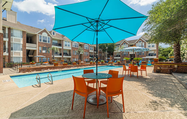 outdoor tables and chairs with umbrella shades