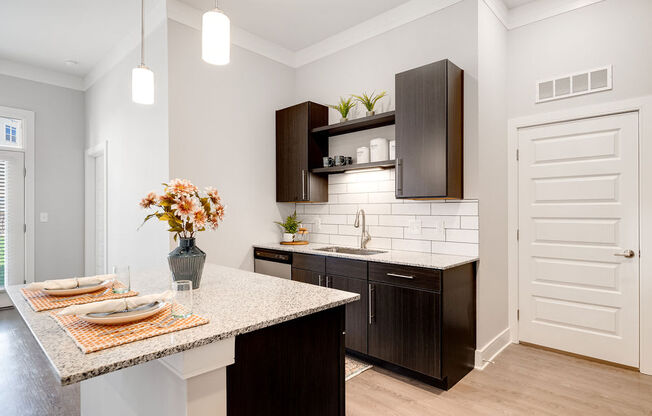 a kitchen with a counter top and