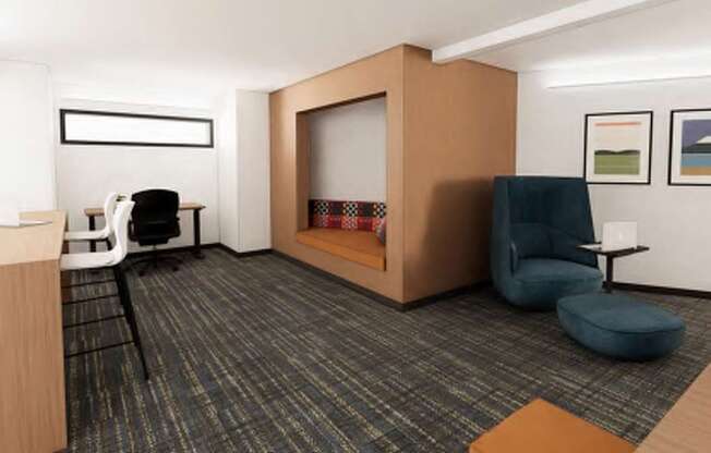 A room with a blue chair and a brown desk.