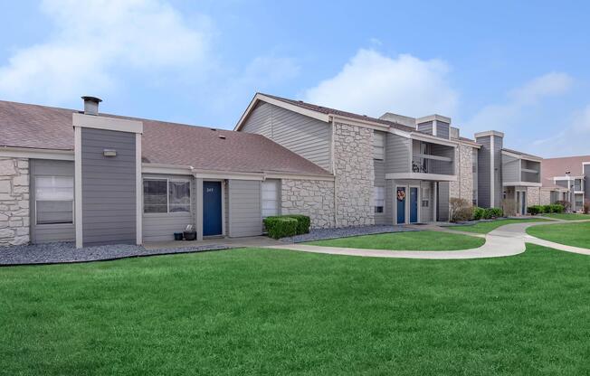 a large lawn in front of a house