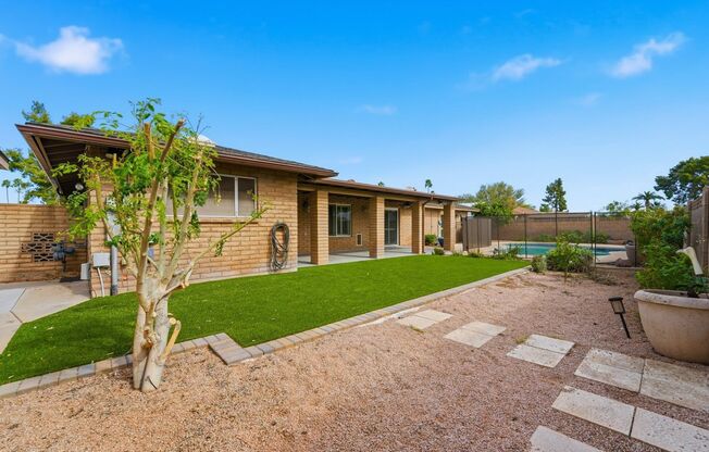 Welcome to this beautiful 4-bedroom, 3-bathroom home in Tempe Arizona!