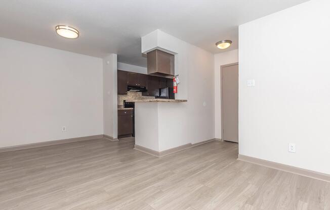 a kitchen with a wooden floor