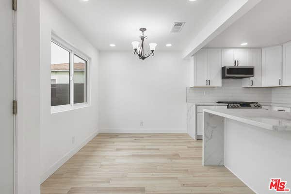 1613 W 209 ST