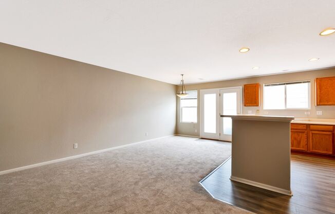3BR Townhome Near DIA & Light Rail | New Carpet, Garage & Fenced Patio