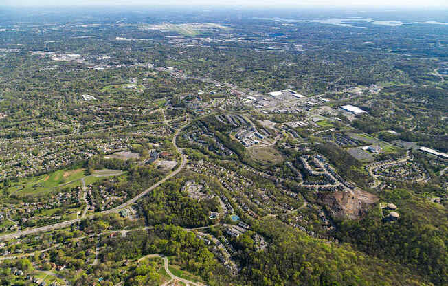 Gallery slide 40 of 42 - a aerial view of a neighborhood with houses and trees
