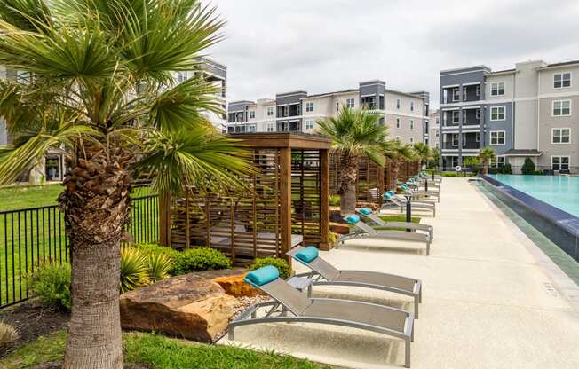 poolside tanning deck and cabanas at Berkshire Creekside apartments