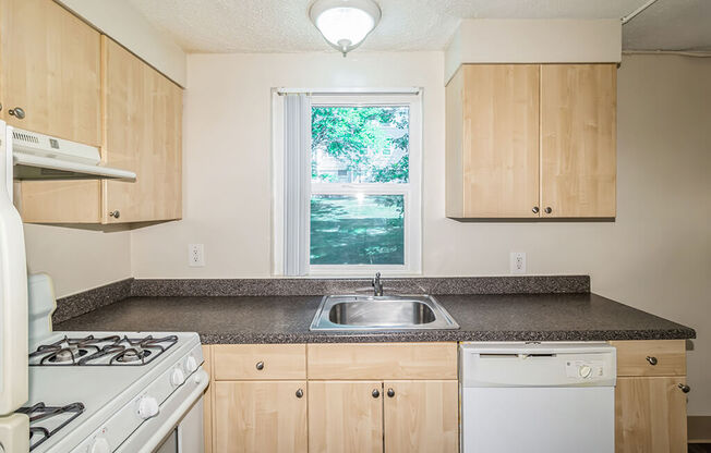 Kitchen cabinets at Sutterfield Apartments in Providence RI