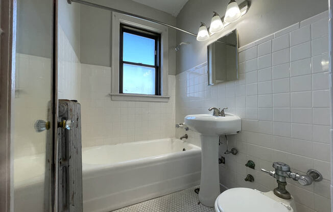 White Bathroom with Character at 1033 W Loyola, Chicago, Illinois