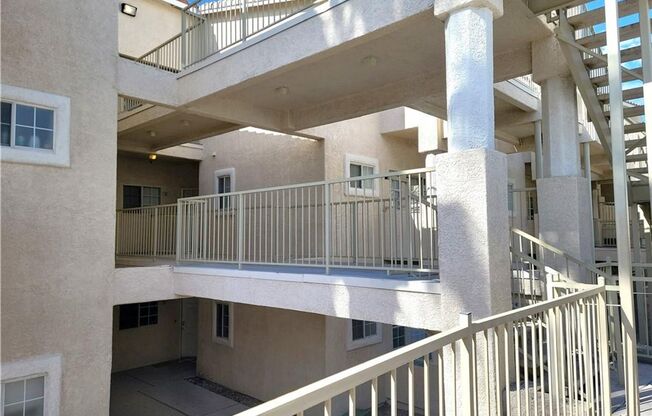 Inviting Green Valley Condo with Dual Balconies & Great Community Amenities!