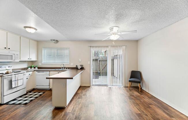 a room filled with furniture and a wood floor