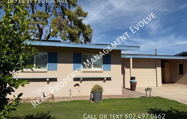 10912 W PEORIA AVE