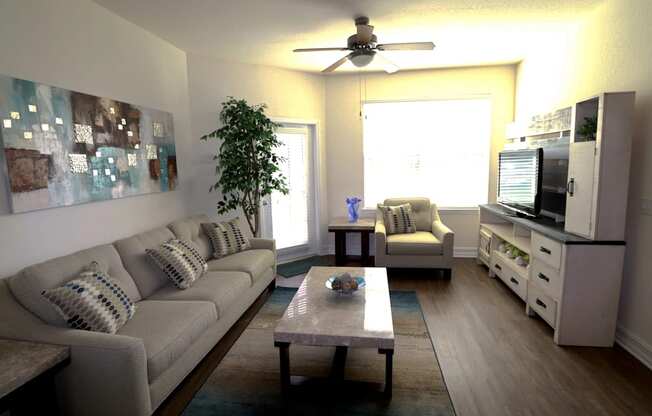 A living room with a grey couch and a coffee table.
