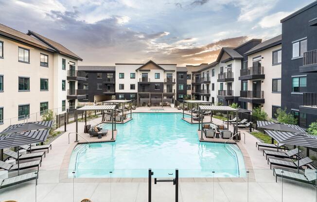 A resort-style pool with cabanas, open skies, and space to unwind under the Arizona sun.