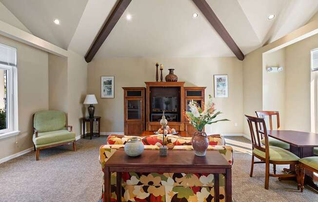 a living room with a couch and a table