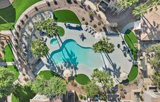 an aerial view of the pool at the resort at longboat key club