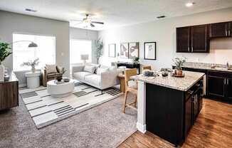 Luxury studio, one, and two bedroom apartment homes featuring granite countertops, stainless steel appliances, and fireplaces at East Lake Flats in Lincoln, NE