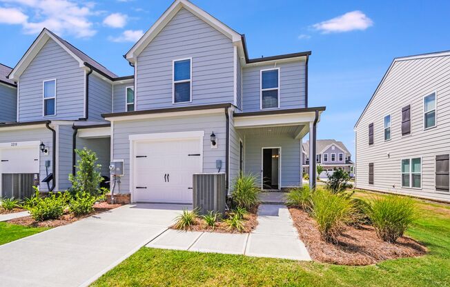 Brand-New End Unit Townhome in Riverstone – Designer Finishes & Future Resort-Style Amenities