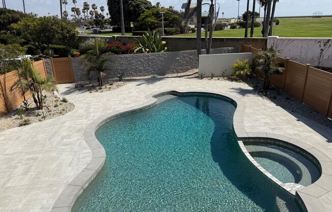 Gorgeous Fully Remodeled 5 Bedroom Home with Saltwater Pool in the Coronado Cays!