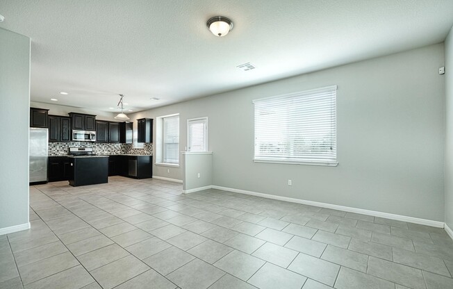 Beautiful 4/2.5/2 two story with office on oversized corner lot!