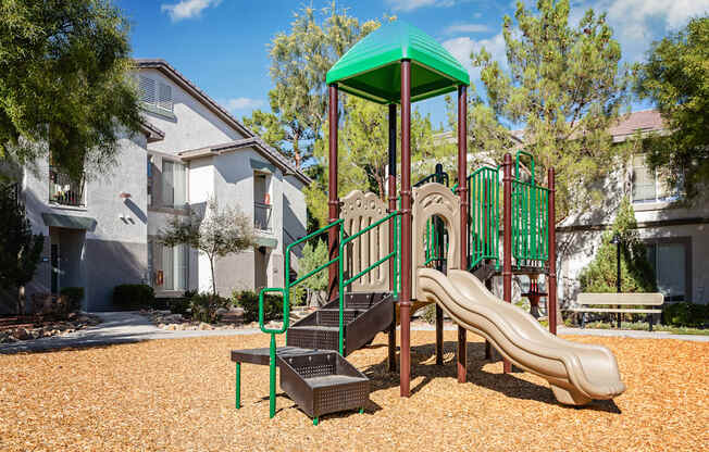 our apartments have a playground with a slide and playset