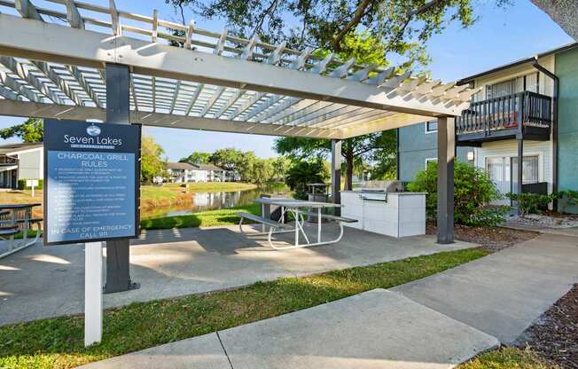 Community pergola and seating area at Seven Lakes at Carrollwood in Tampa, Florida.