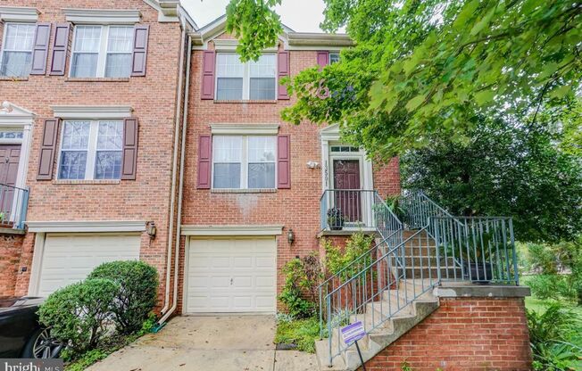 Lovely end unit three level townhome.