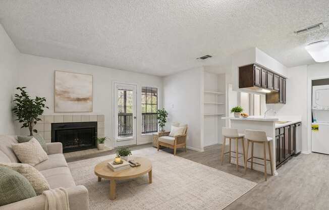 A living room with a fireplace and a couch.