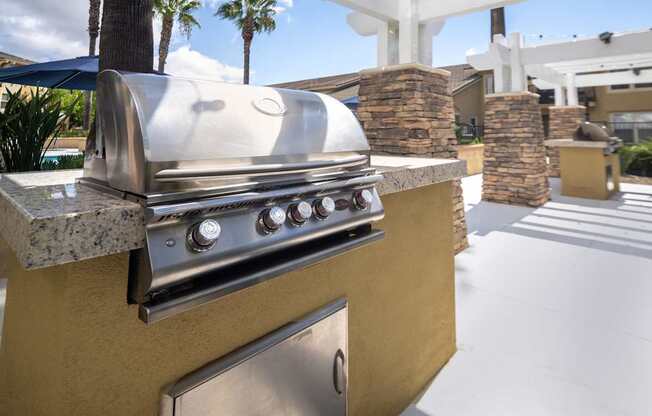 Gas barbecue grills at pool area at 55+ FountainGlen Temecula
