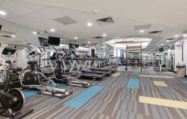 fitness center with cardio equipment