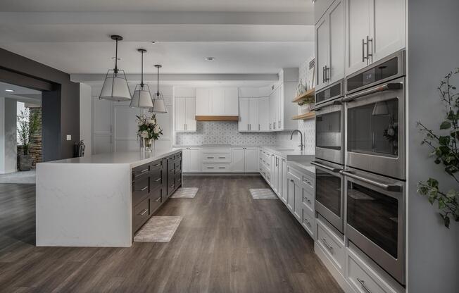 a kitchen with a wood floor