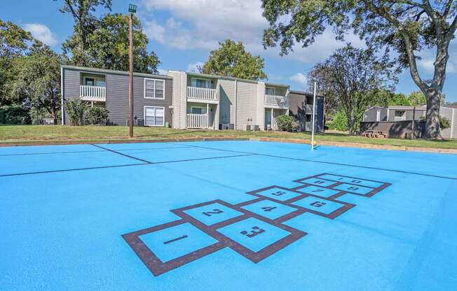 Hopscotch game in front of our apartment buildings at Maplewood apartments in Shreveport, LA.
