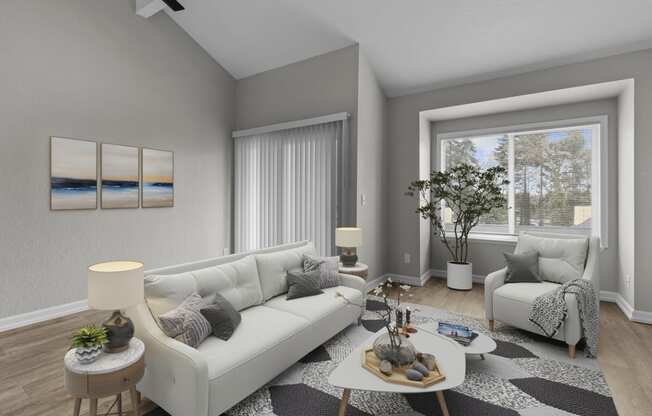 a living room with grey walls and white couches