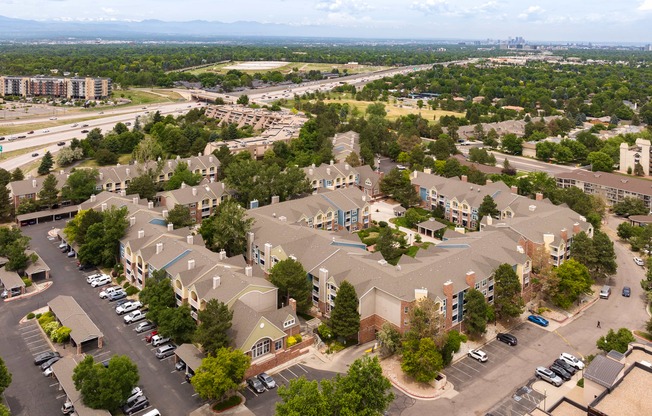 an aerial view of an empty parking lot in a city