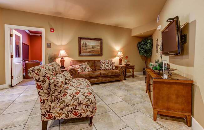 a living room with a couch and a tv