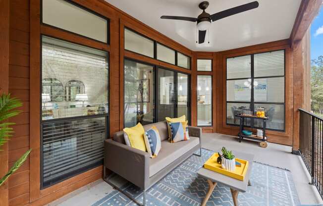 a living room with a couch and a table