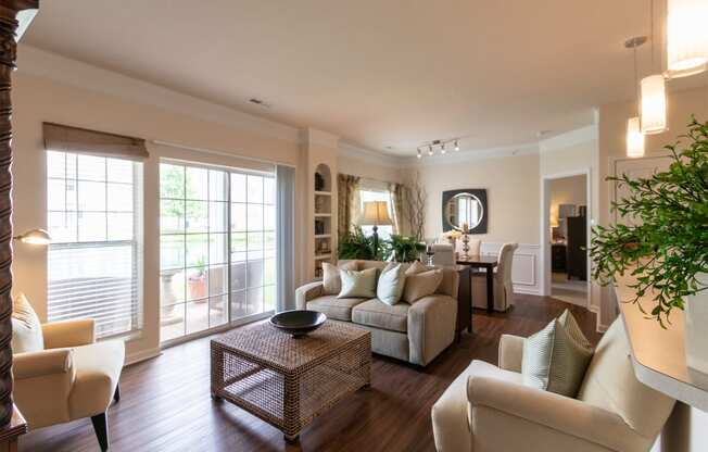 This is a photo of the living room and dining area in the 2 bedroom, 2 bath Islander floor plan at Nantucket Apartments in Loveland, OH.