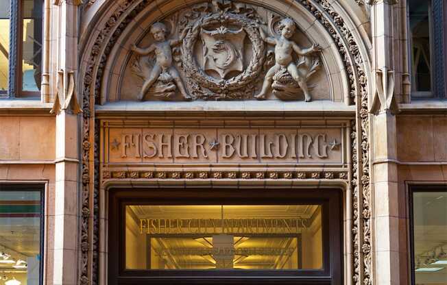 the entrance to the fisher building in the city