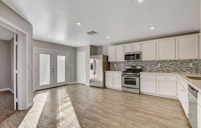 Totally Updated Solar Powered 4 Bedroom! Bedroom and Bath Downstairs!