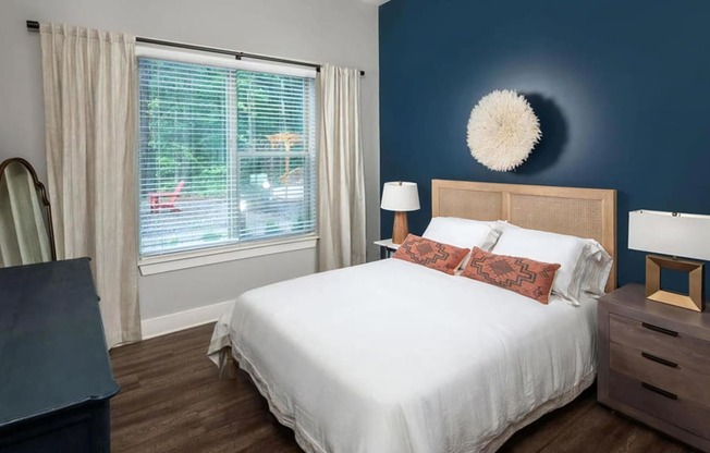 Large Windows Allow In Plentiful Natural Light Featuring Blinds