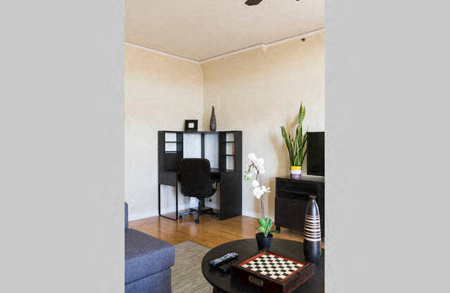 living room with offic ein corner