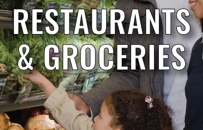 A person is shopping for groceries in a market.