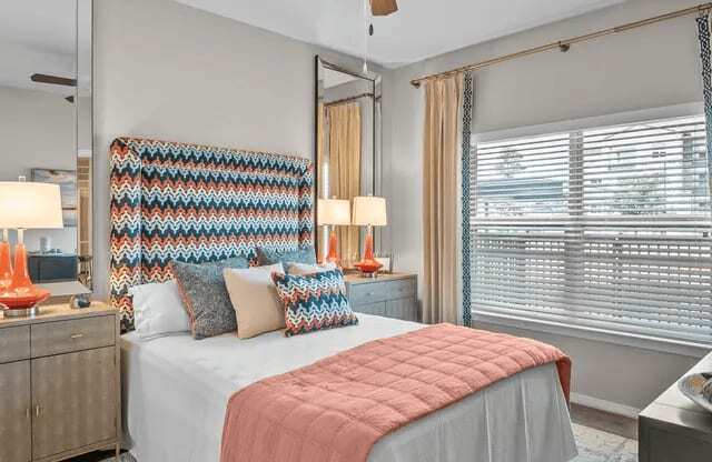 a bathroom with a bathtub and a sink