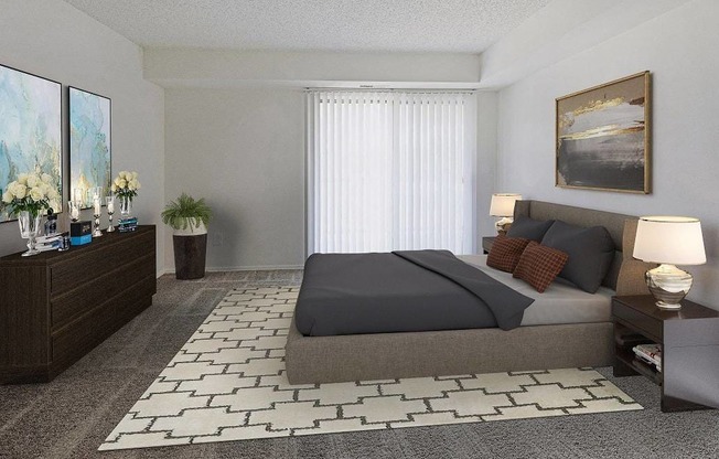 A bedroom with a large bed, a nightstand with a lamp, and a painting on the wall.