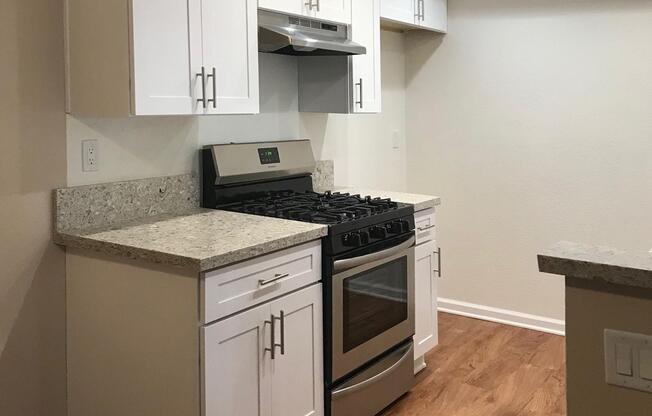 vacant kitchen with stainless steel appliances