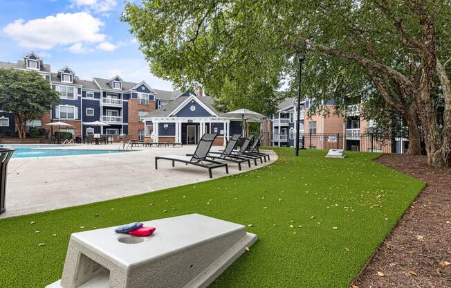 the preserve at ballantyne commons apartments with a swimming pool and grass