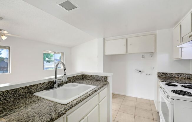 Available now! The Perfect Start Quaint & Charming 2nd Story Condo.