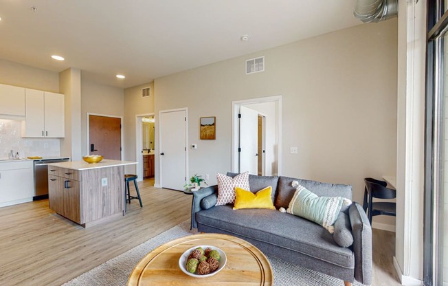 a living room with a couch and a coffee table