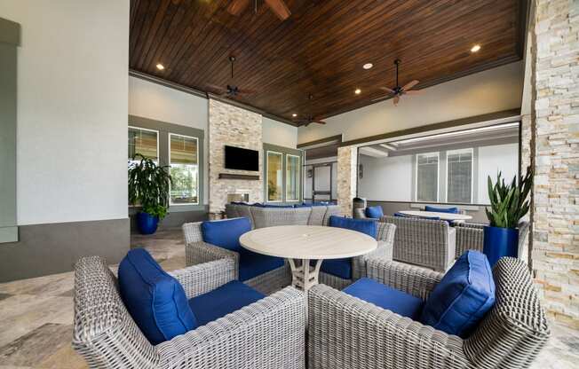 the preserve at ballantyne commons clubhouse with couches and tables