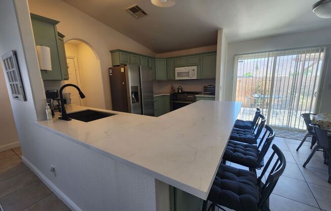 Fully Furnished 3 Bedroom Home w/ Covered Back Patio